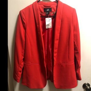 Bright red blazer.